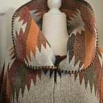 Geometric Poncho with Versatile Neckline