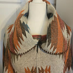 Geometric Poncho with Versatile Neckline
