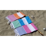 Over-sized, colorful bold stripes, our Mediterranean towel is beautifully hand-loomed with hand-tied fringe. 