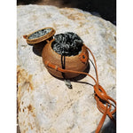 The sweetest island bag, perfect for your must have items: lip balm, room key and that pretty little shell you found on the beach! An eco-friendly purse, made with 100% natural products such as Ata sea grass, leather strap and cotton batik lining.   Snap closure ensures your treasures stay put.