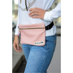 A sizable compartment can secure a cell phone, wallet, and sunglasses. 