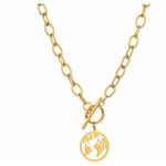 Close up of gold chain necklace and world map pendant charm.